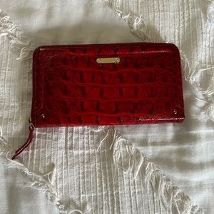 Red croc Brahmin wallet.